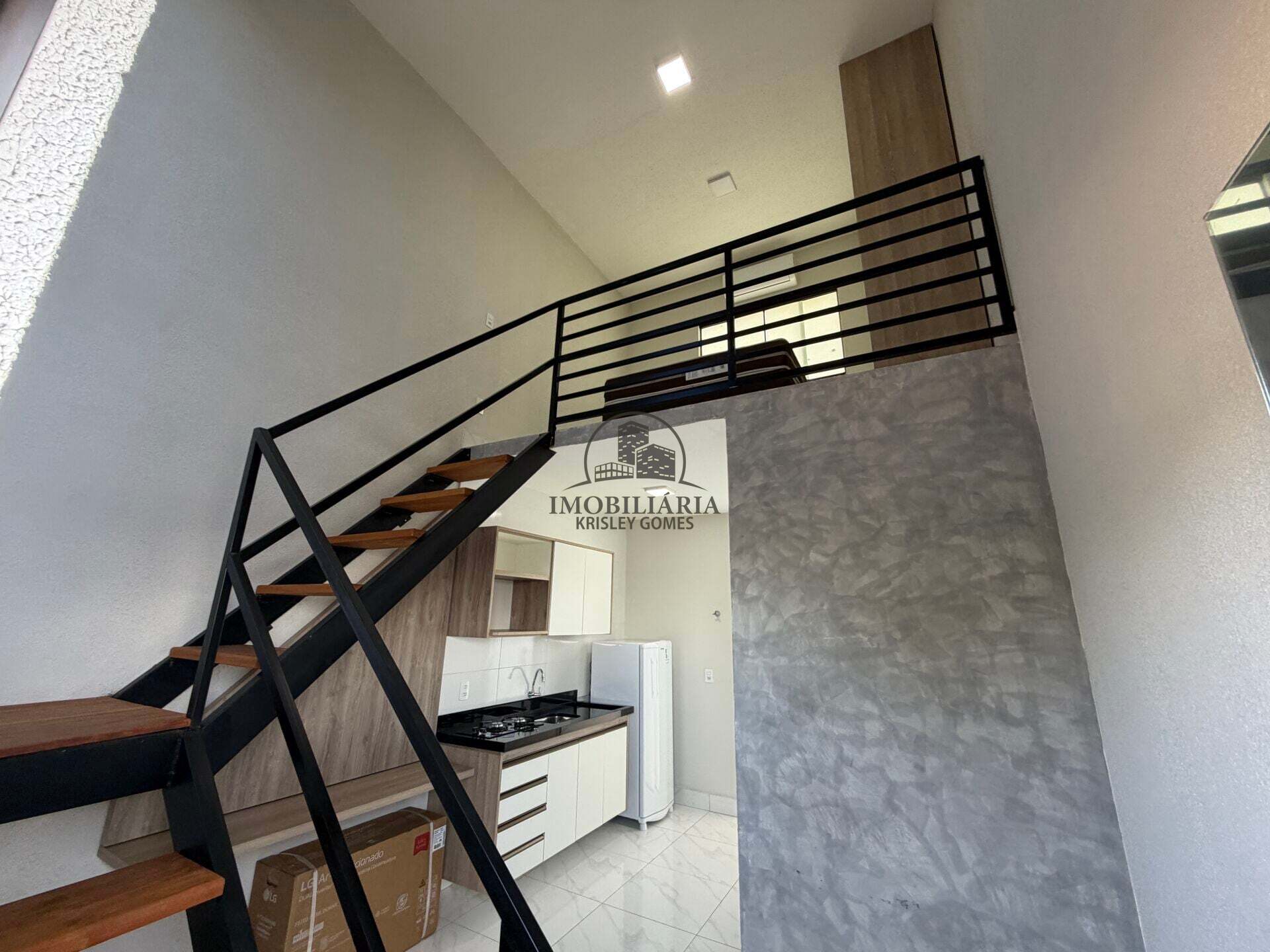 Living do loft com mezanino